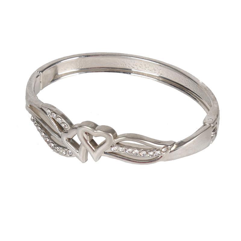Two Hearts Tailing Silver Bangle